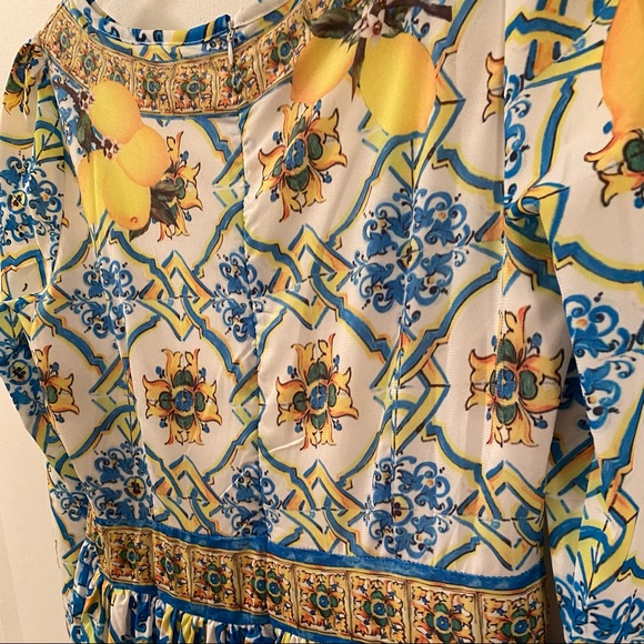 Beautiful lined yellow and blue printed long sleeve dress. Fits size 8 $25 - Picture 6 of 7